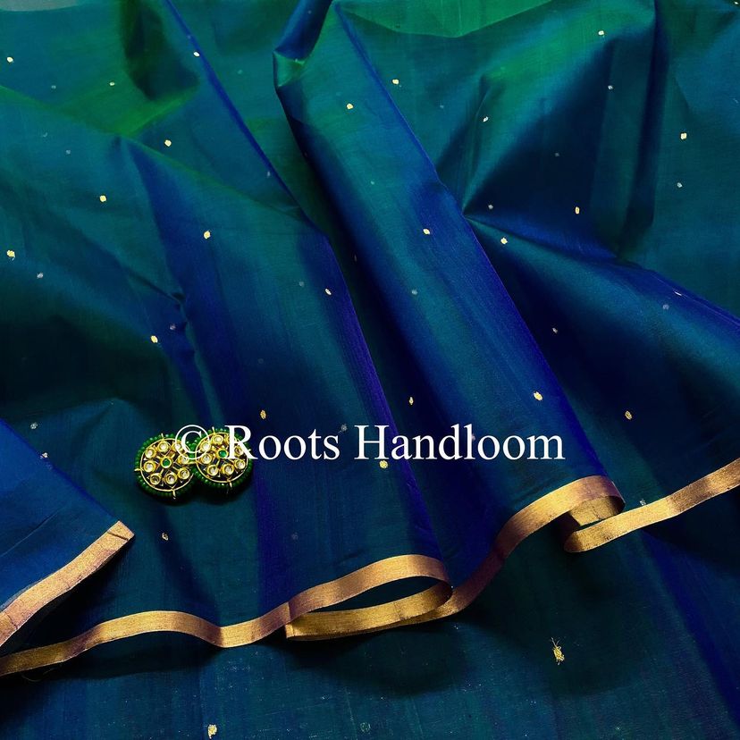 Peacock blue and green dual tone Chanderi organza silk saree with zari bootis all over