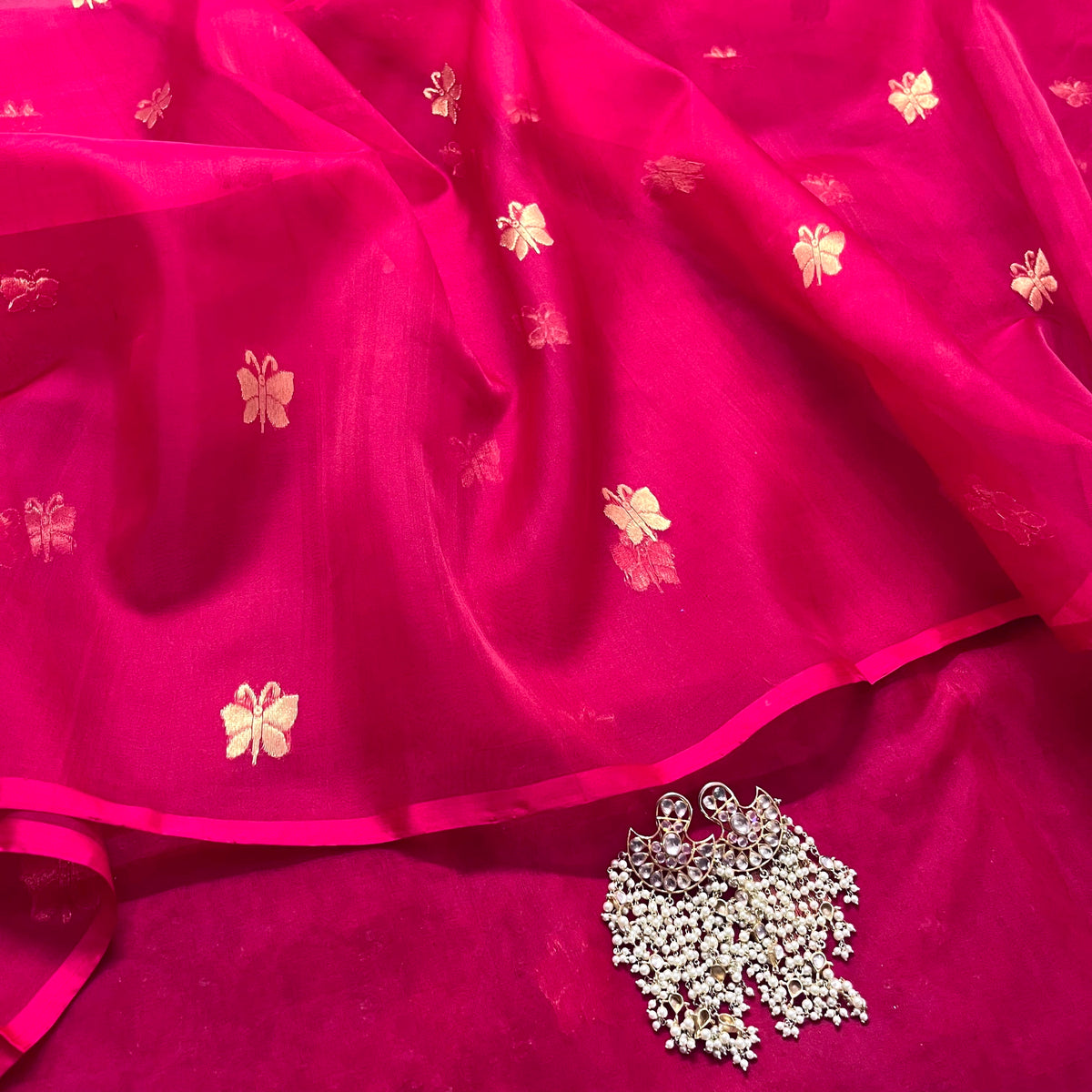 Rani pink Chanderi silk saree with butterfly motifs all over