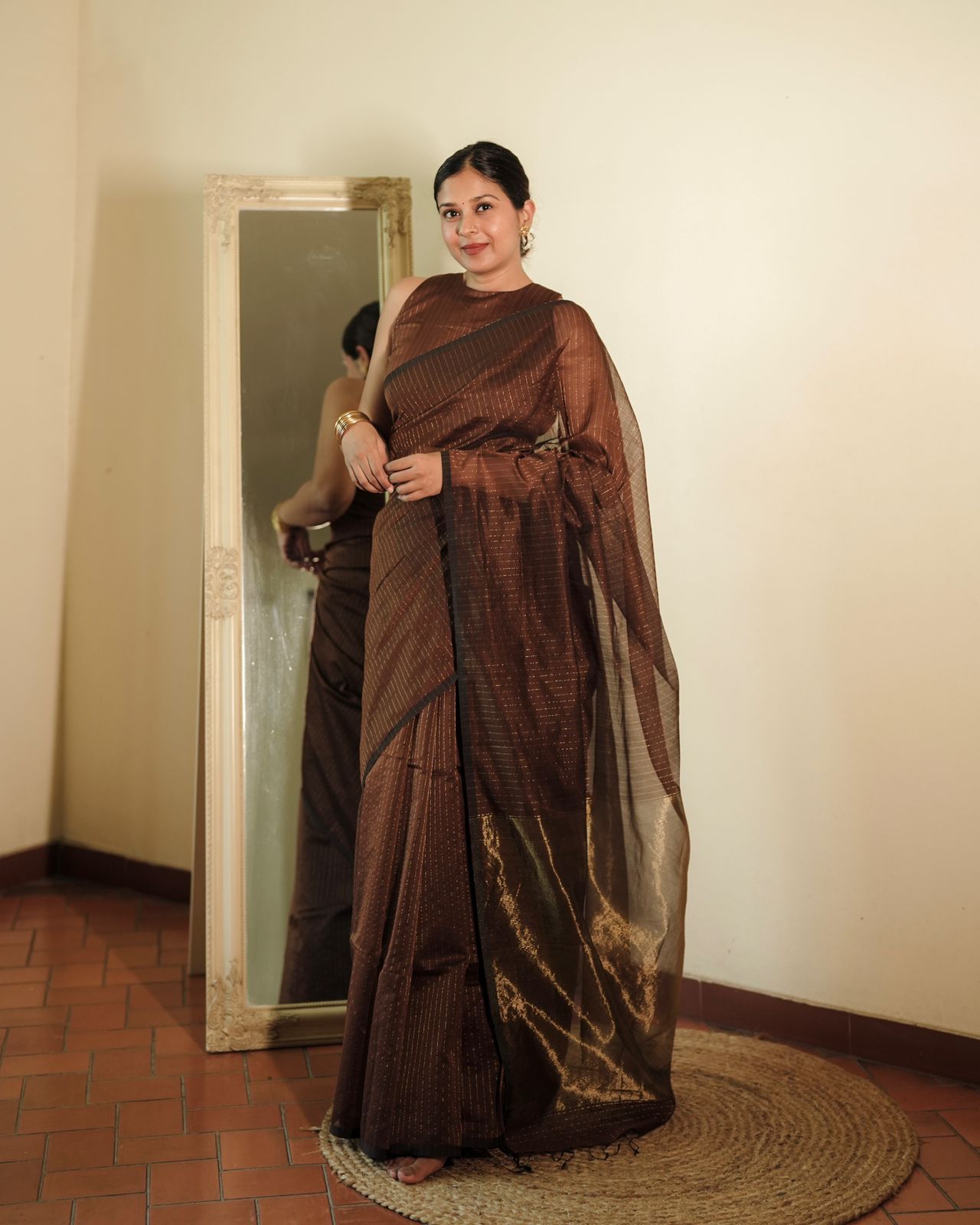Chocolate brown Maheshwari saree with zari lines all over