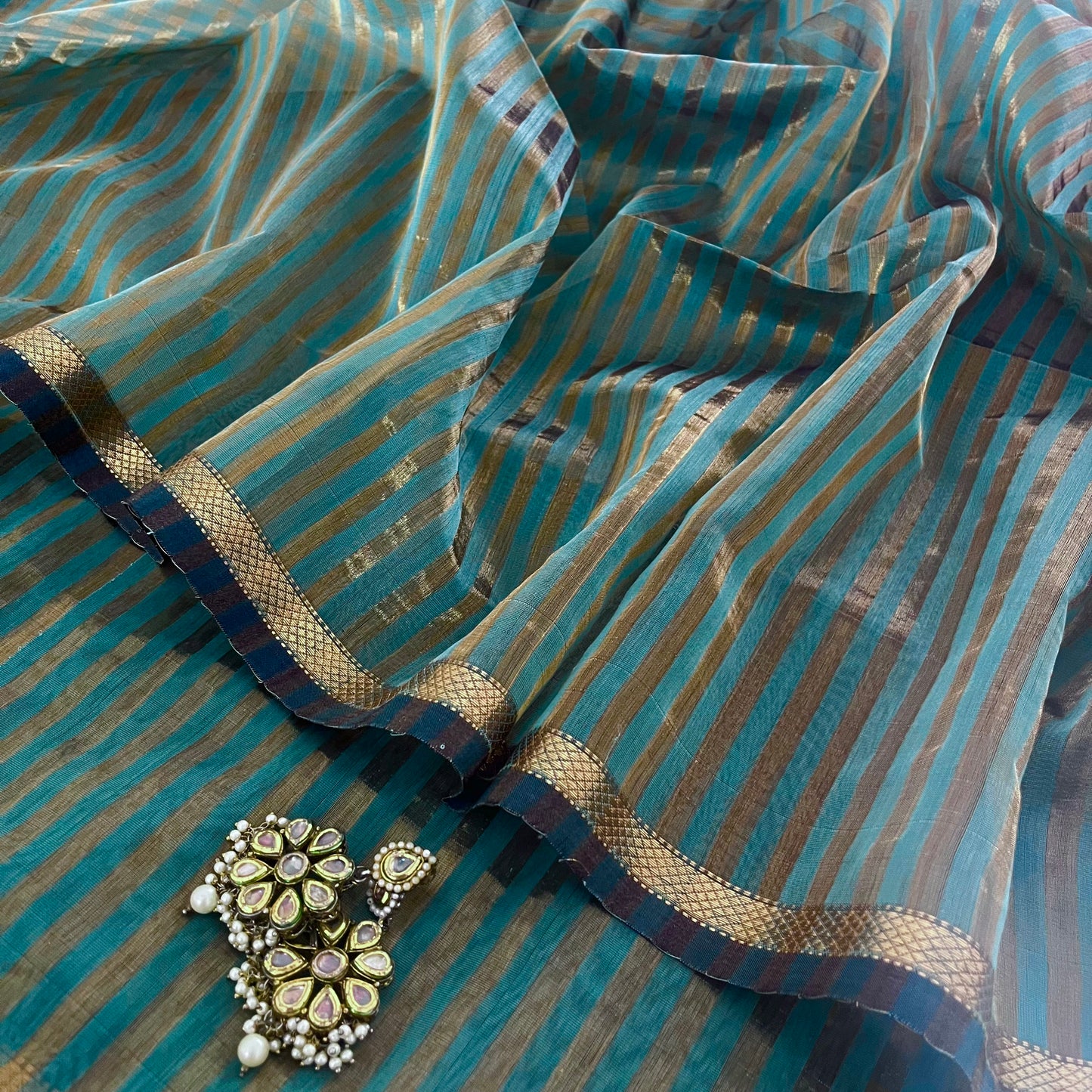 Baby blue Maheshwari saree with zari stripes all over