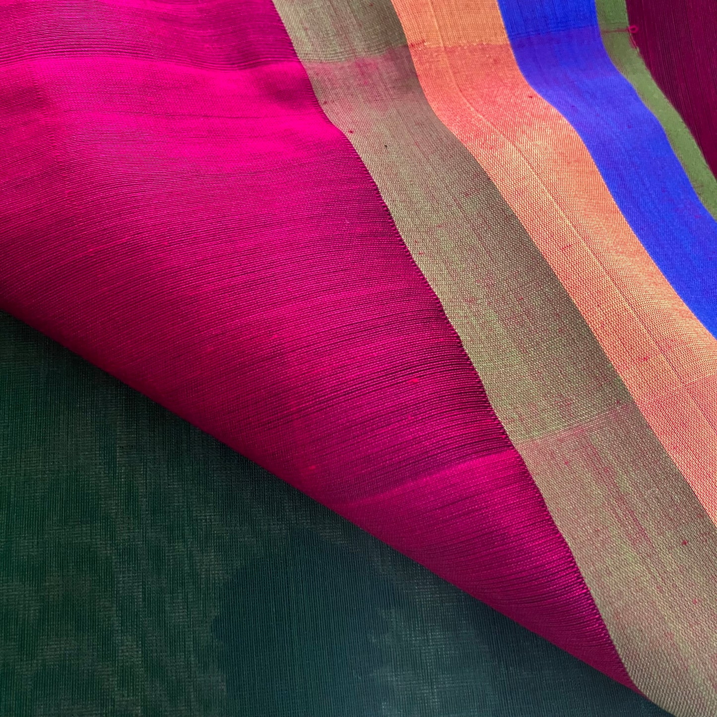 Green and pink Maheshwari saree with zari border
