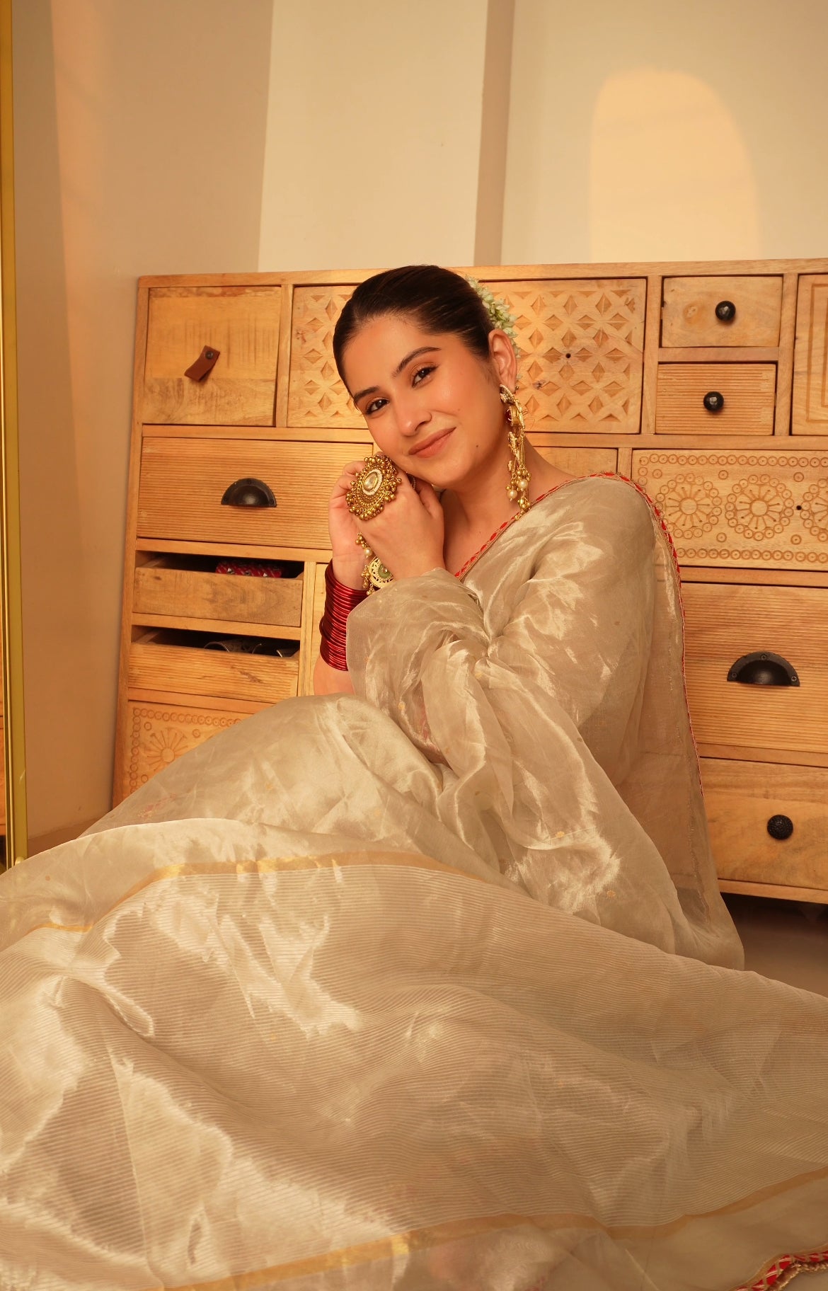 Chantilly cream and red Chanderi tissue silk saree with zari bootis all over