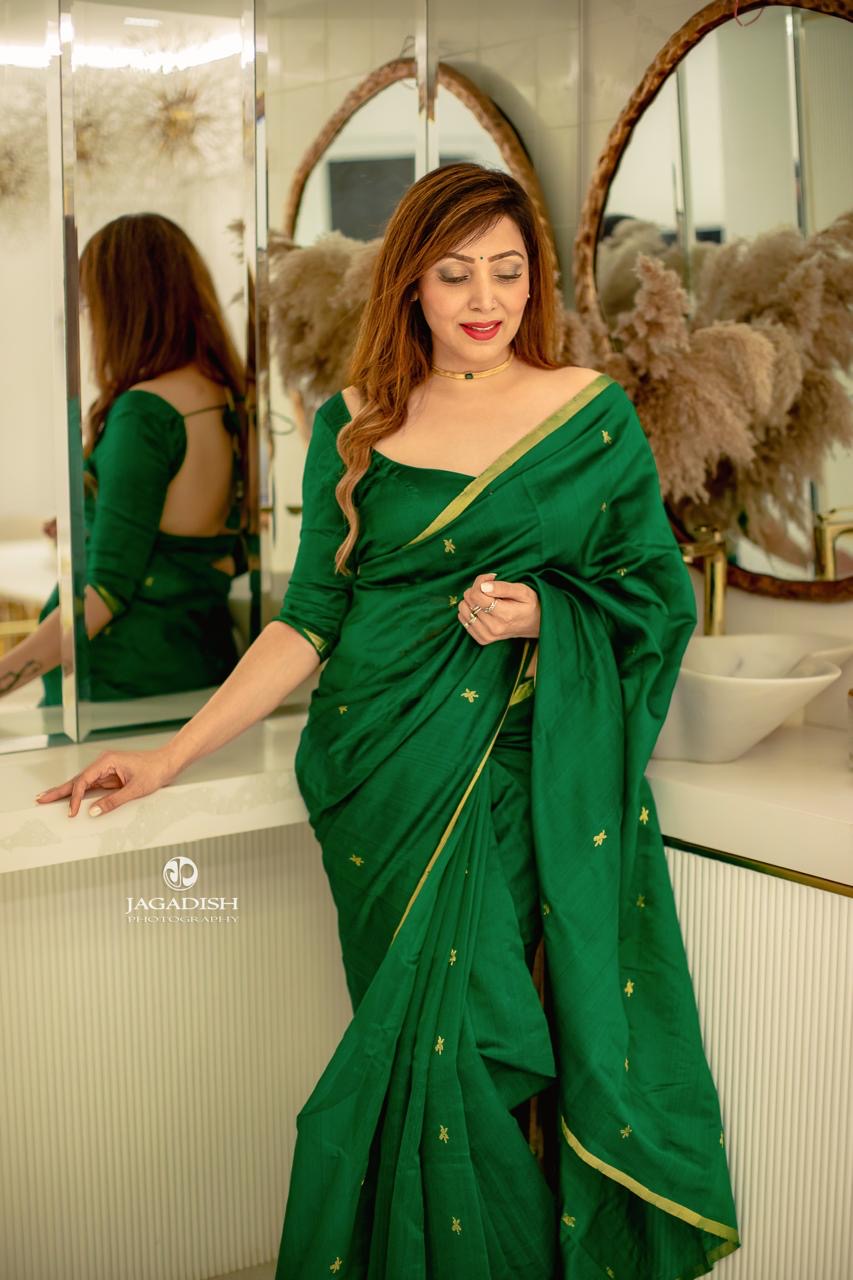Emerald green chanderi silk saree with flower bootis all over