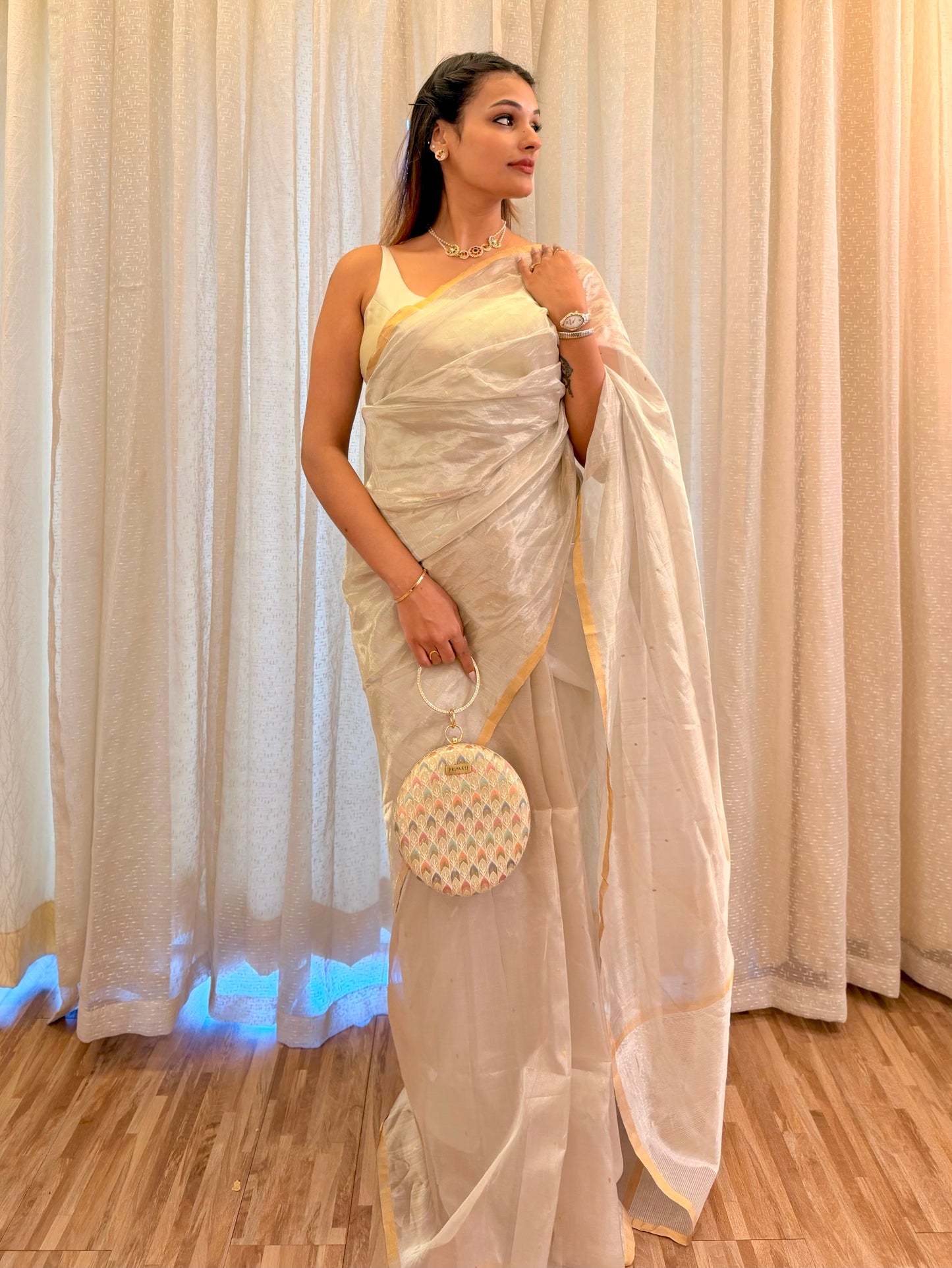 Chantilly cream Chanderi tissue silk saree with zari bootis all over