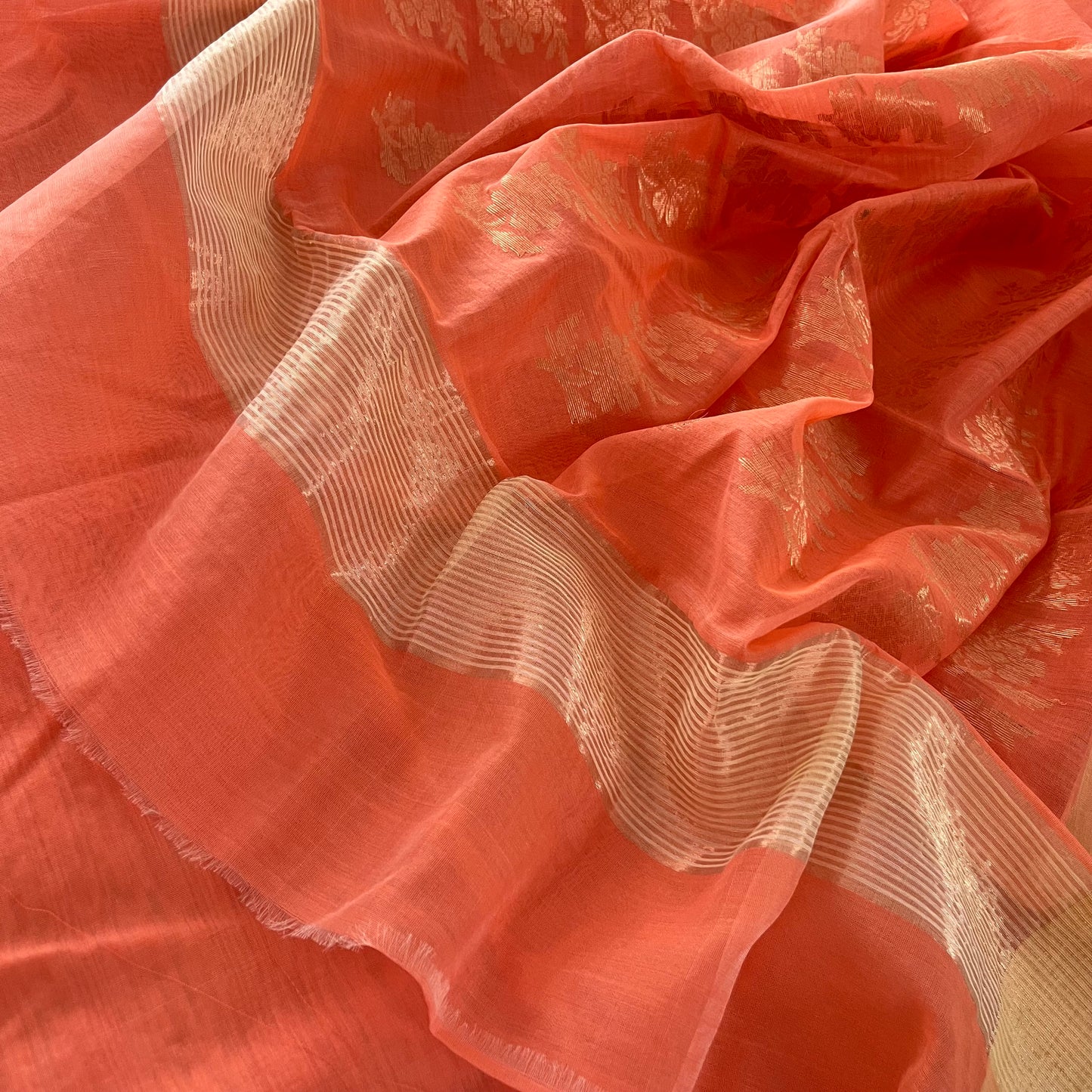 Peachish pink Chanderi saree with zari pattern on pallu