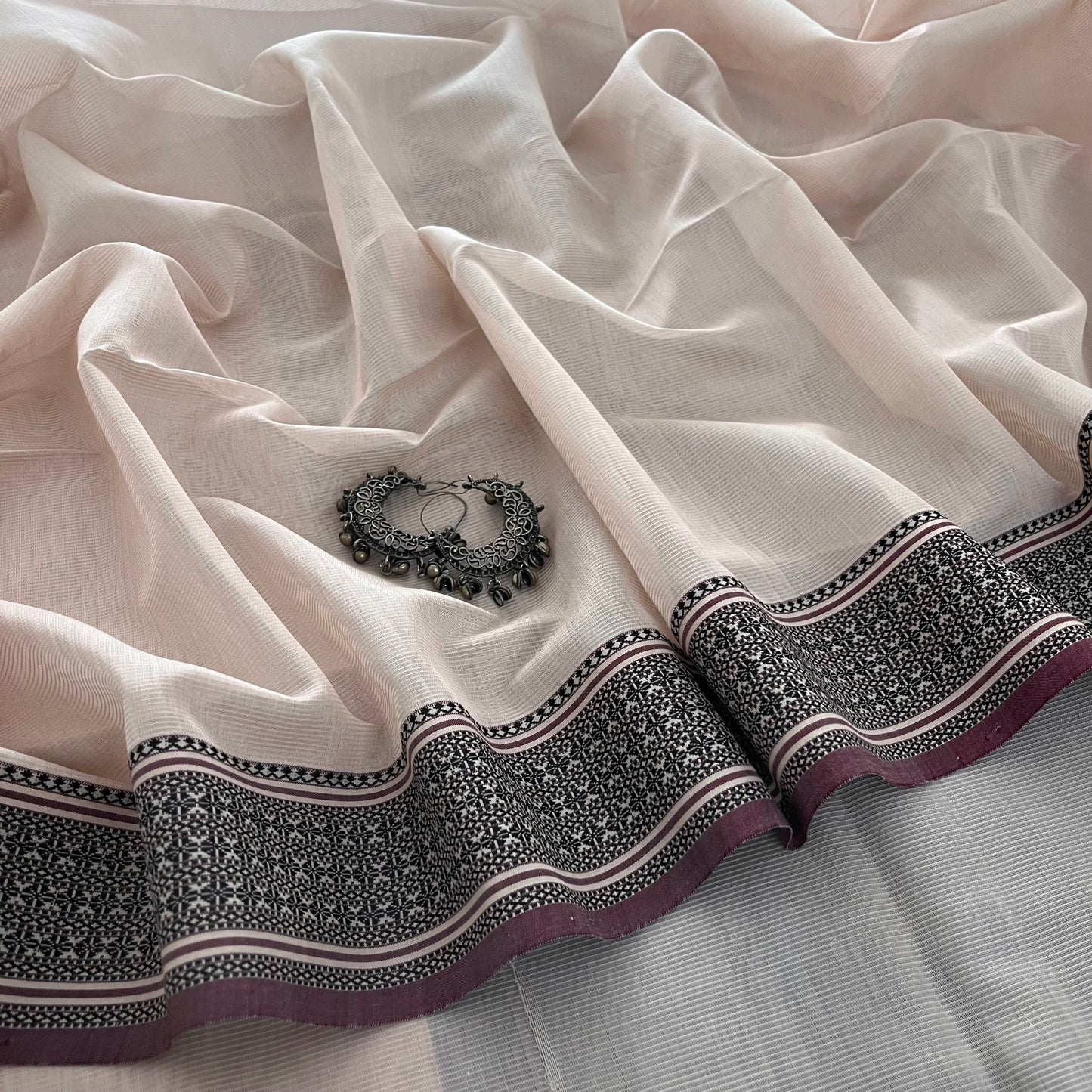 Sand and black Maheshwari saree with resham border