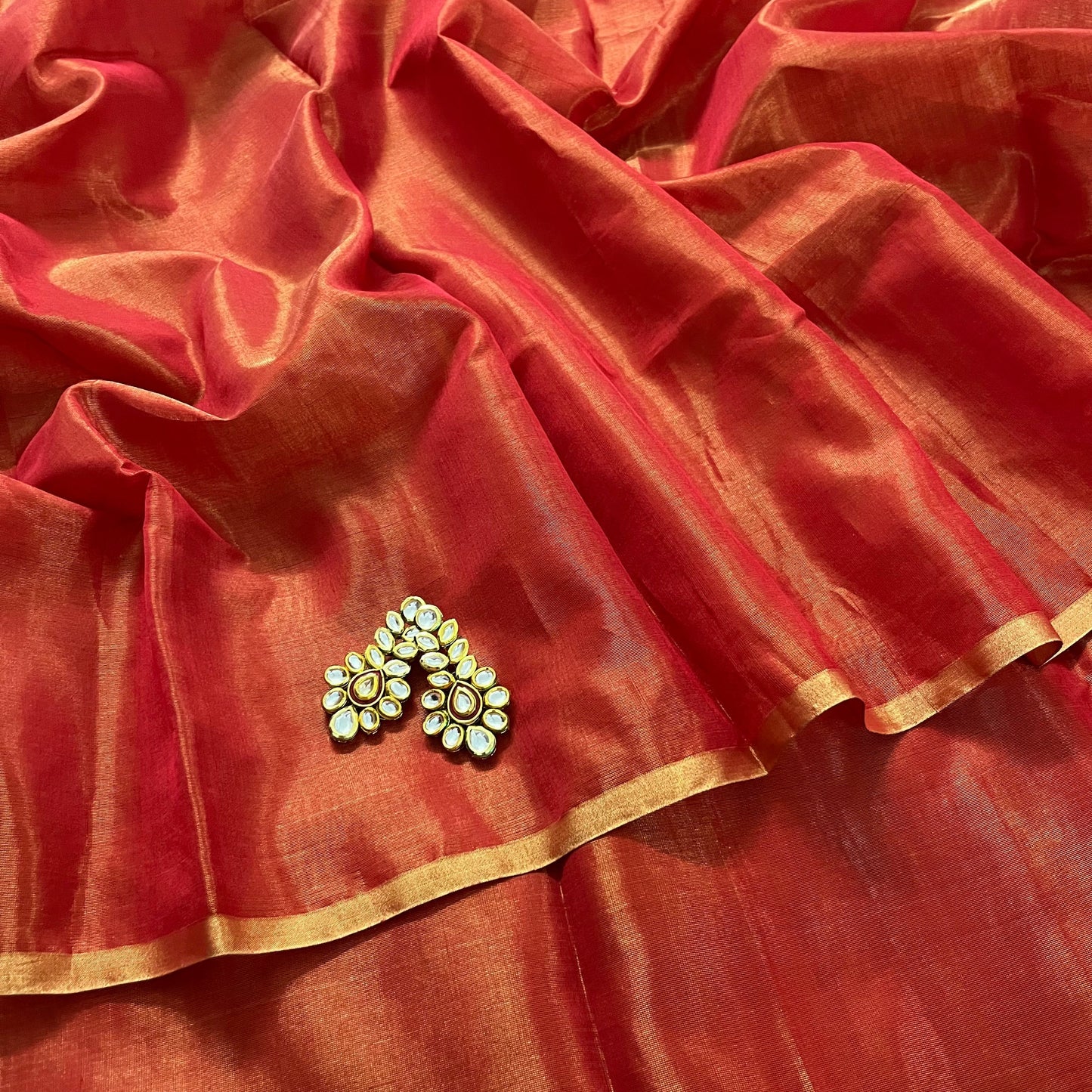Red maheshwari tissue silk saree with zari lines on pallu