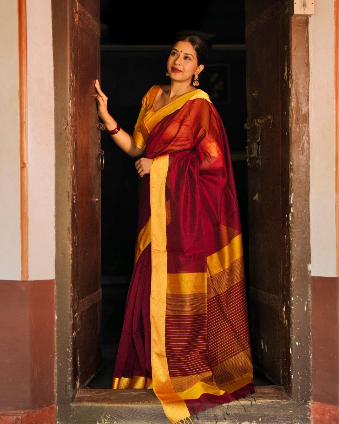 Maroon and yellow maheshwari with resham border