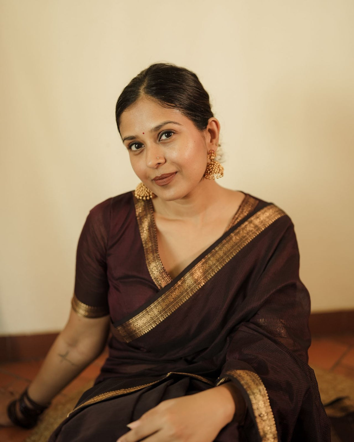 Mahogany Maheshwari saree with zari border and zari lines on pallu