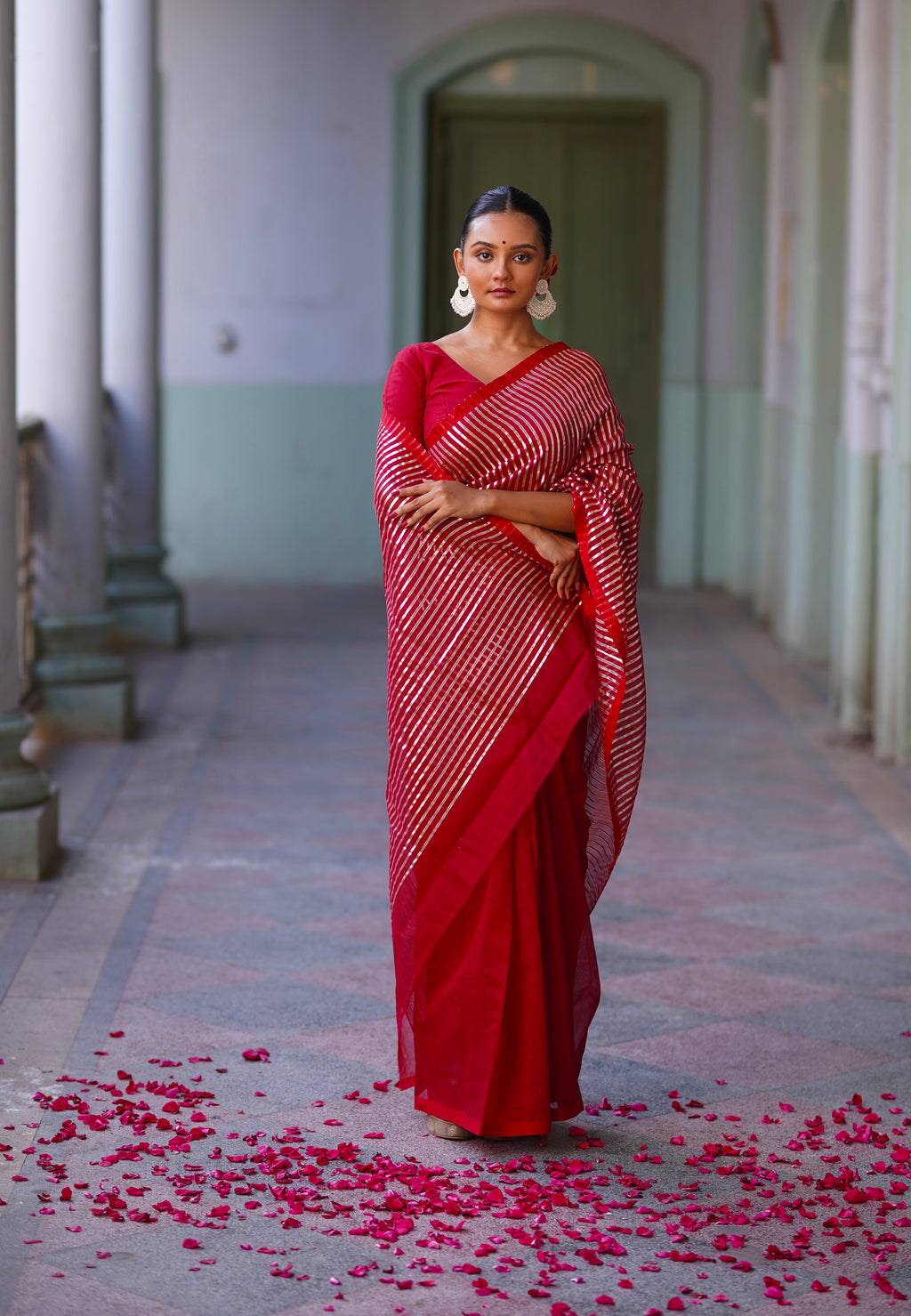 Deep red chanderi saree with intricate gota work all over