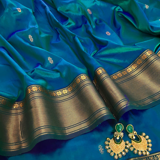 Peacock blue dual tone Maheshwari silk saree with flower bootis all over