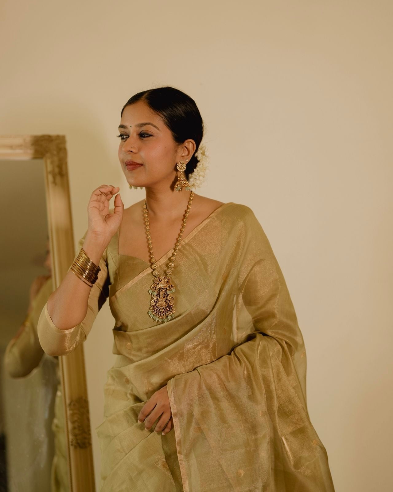 Olive gold Maheshwari tissue silk saree with zari bootis all over