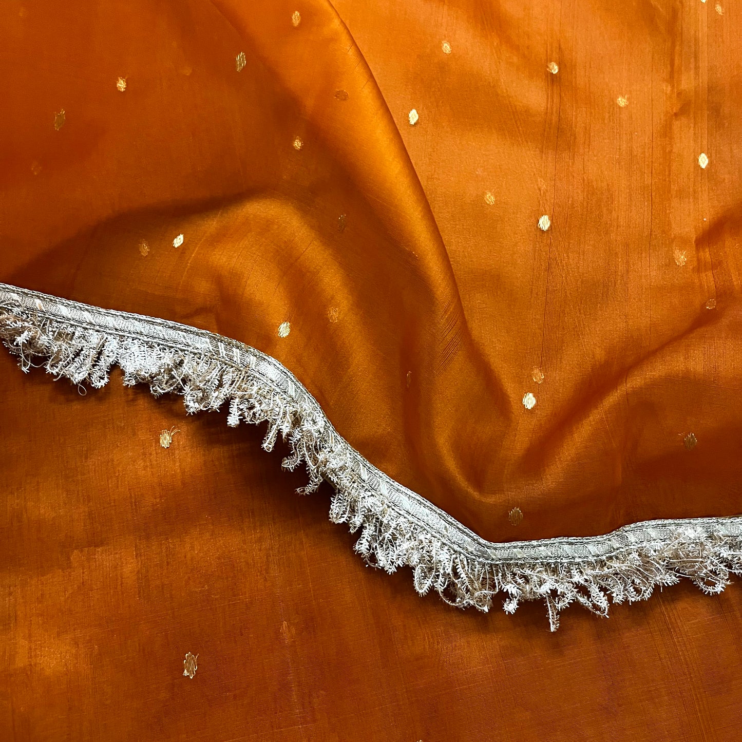 Burnt Orange Chanderi silk saree with zari bootis all over