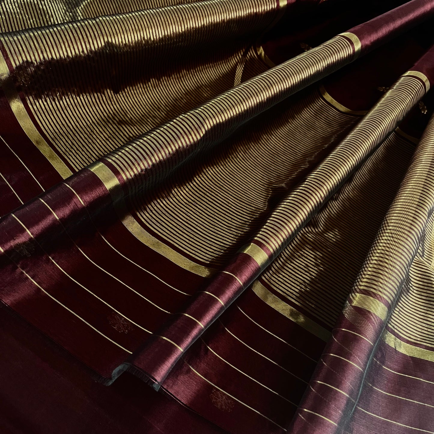 Mahogany Chanderi silk saree with flower bootis all over