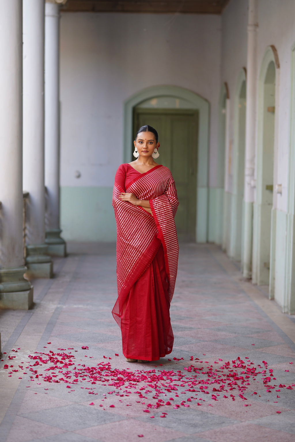 Deep red chanderi saree with intricate gota work all over