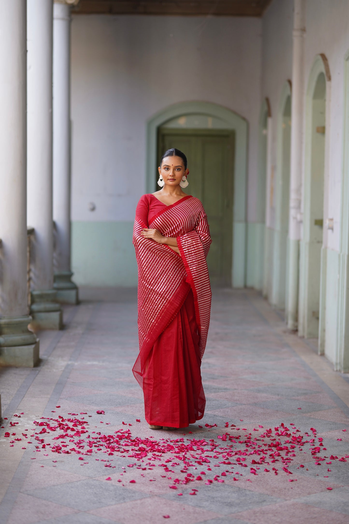 Deep red chanderi saree with intricate gota work all over