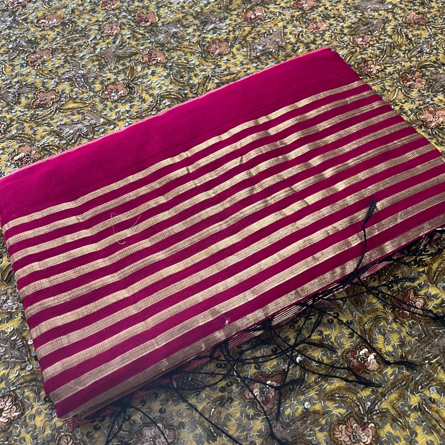 Dark pink Maheshwari saree with zari stripes all over