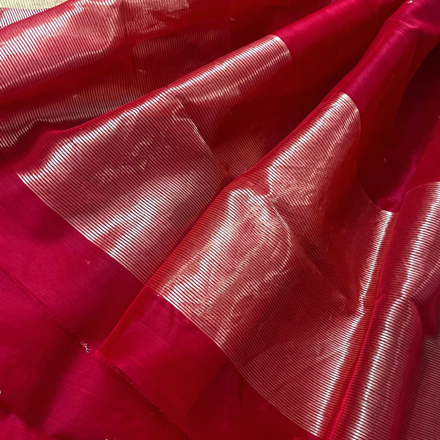 Deep red chanderi organza silk saree with zari bootis all over