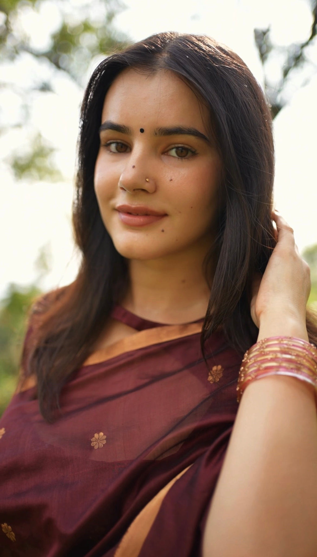 Mahogany Chanderi silk saree with flower bootis all over