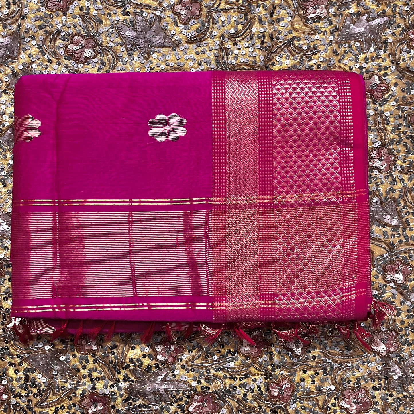 Pink Maheshwari saree with flower bootis all over