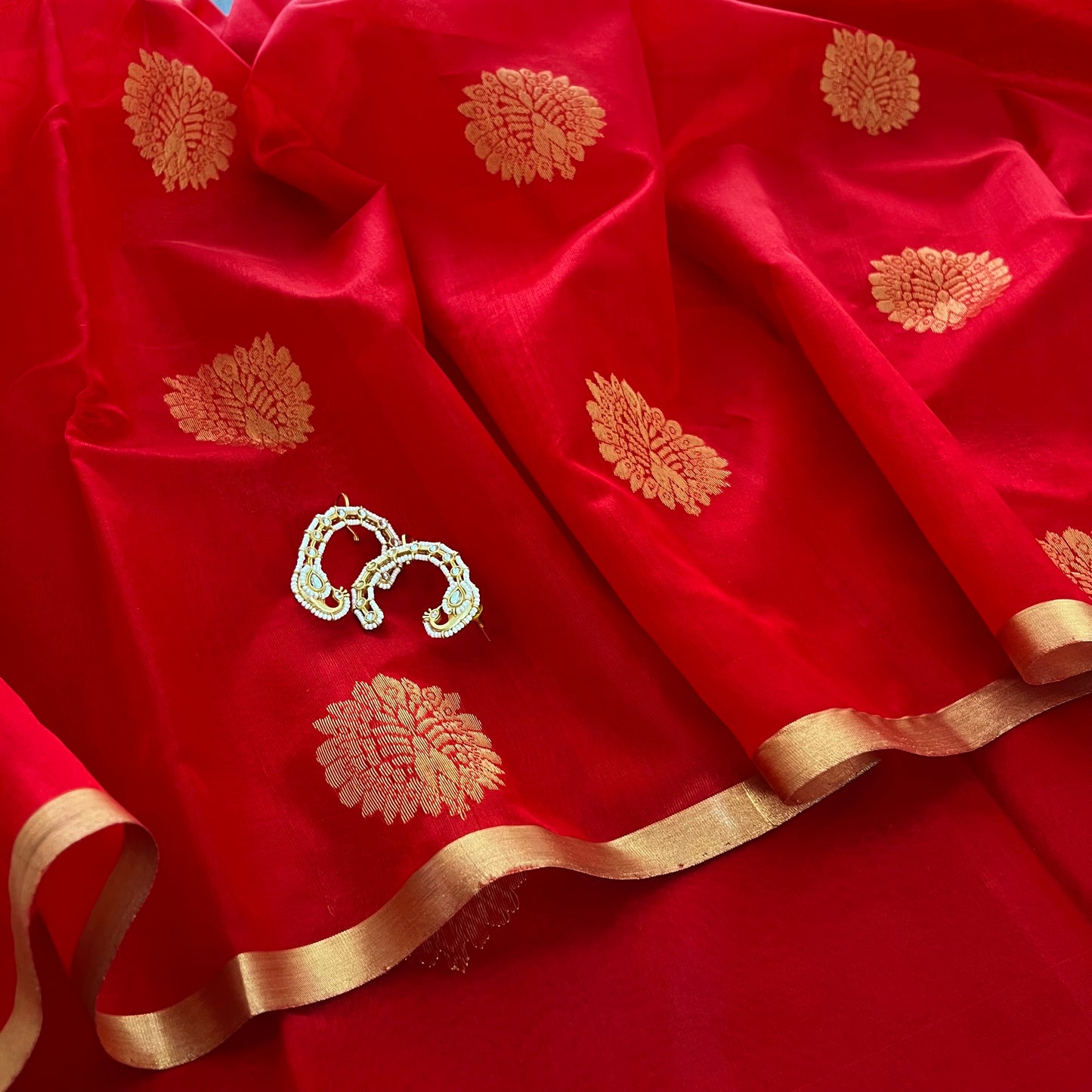 Red Chanderi silk saree with mor motifs all over