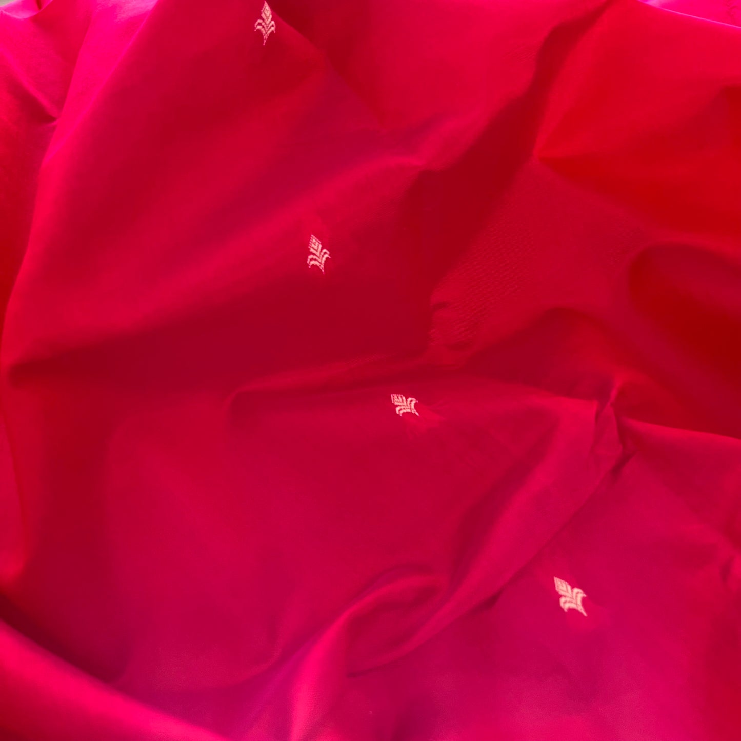 Pinkish Red dual tone Banarasi silk saree with resham bootis all over