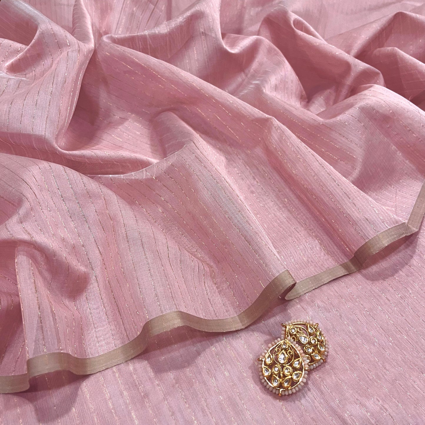 Pastel Pink Maheshwari saree with zari lines all over