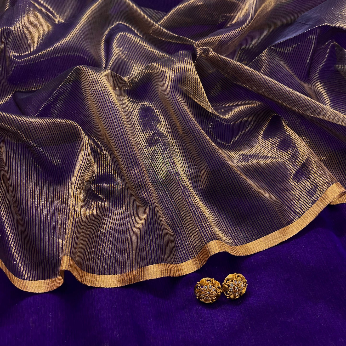 Dark purple and gold maheshwari saree with zari border