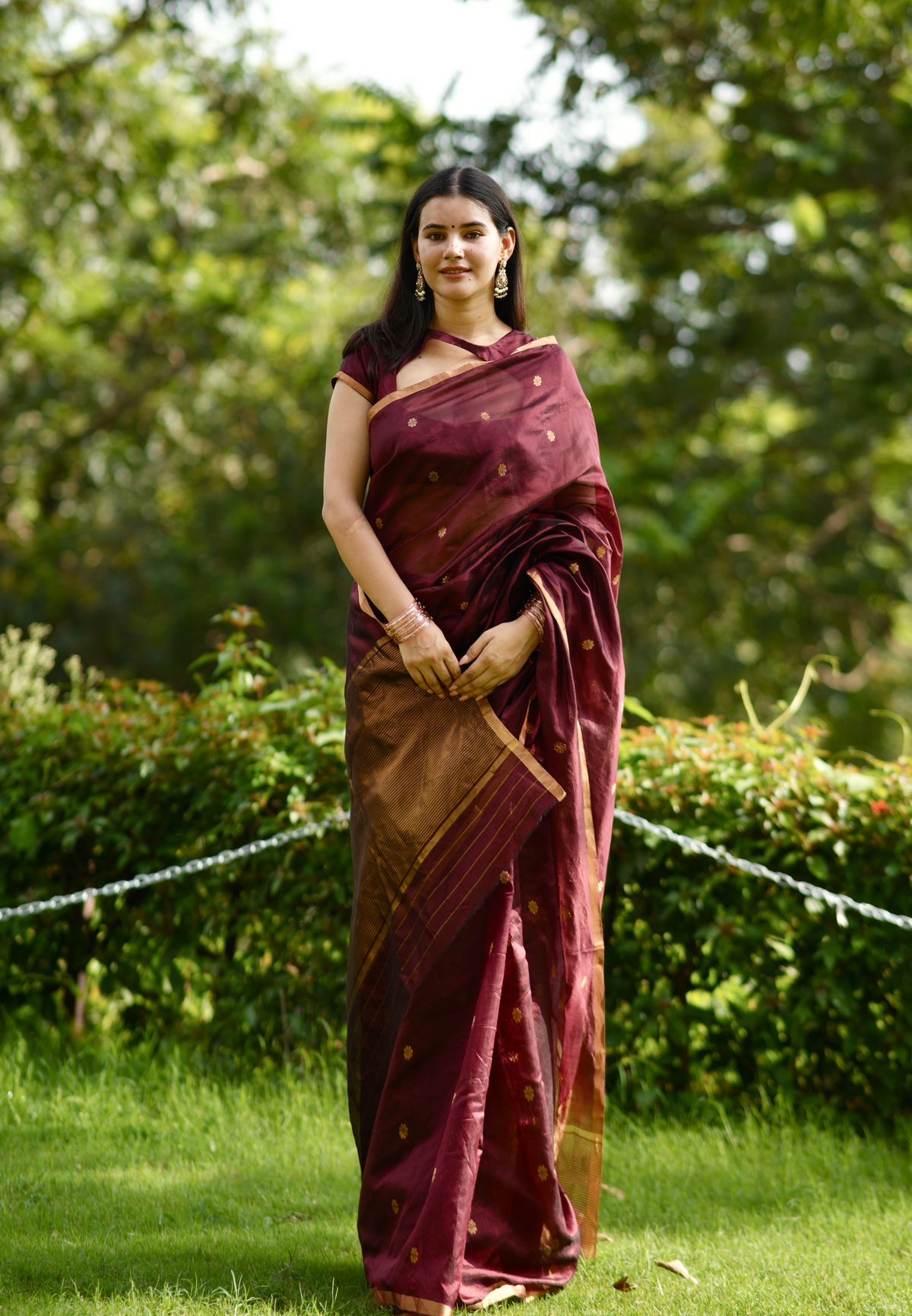 Mahogany Chanderi silk saree with flower bootis all over