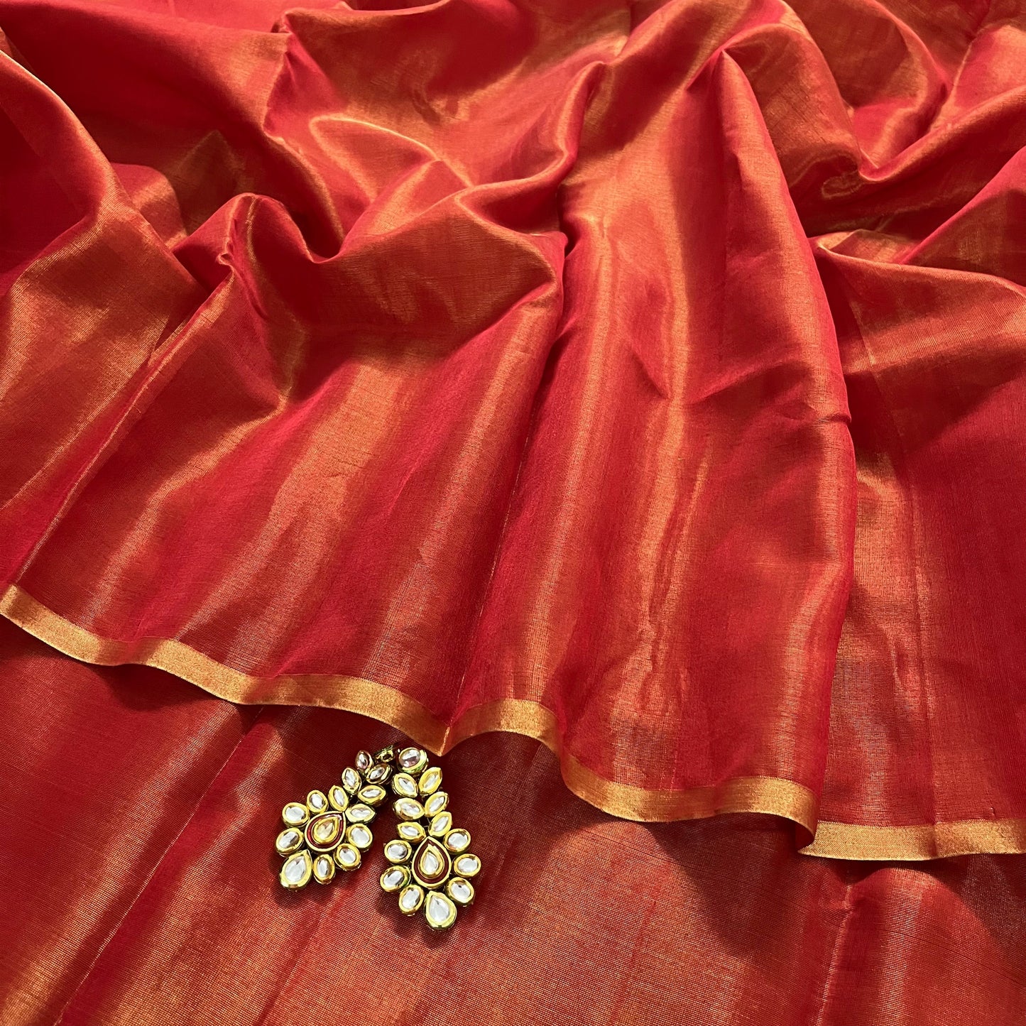 Red maheshwari tissue silk saree with zari lines on pallu
