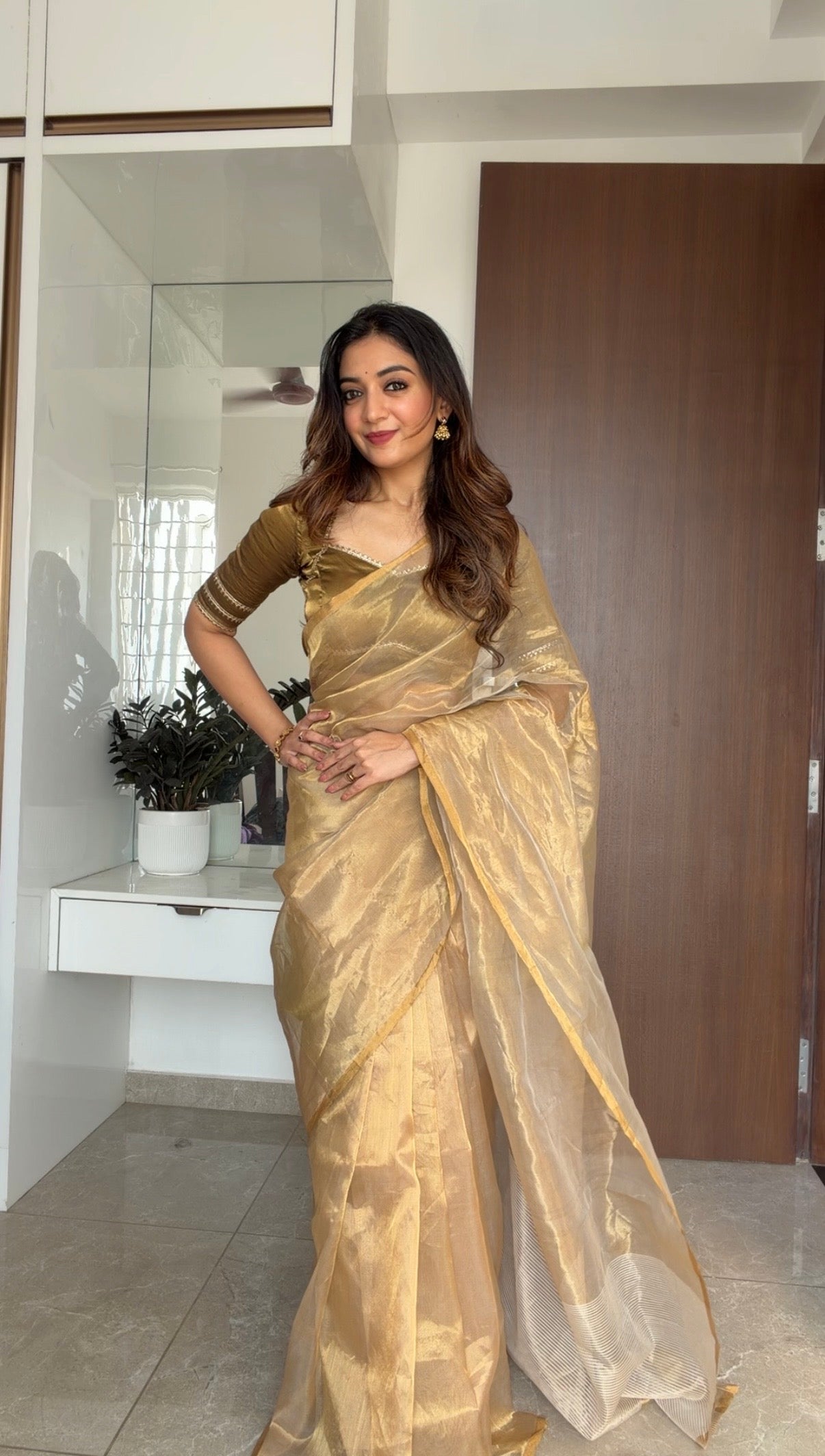 Gold Chanderi tissue silk saree with zari lines on pallu