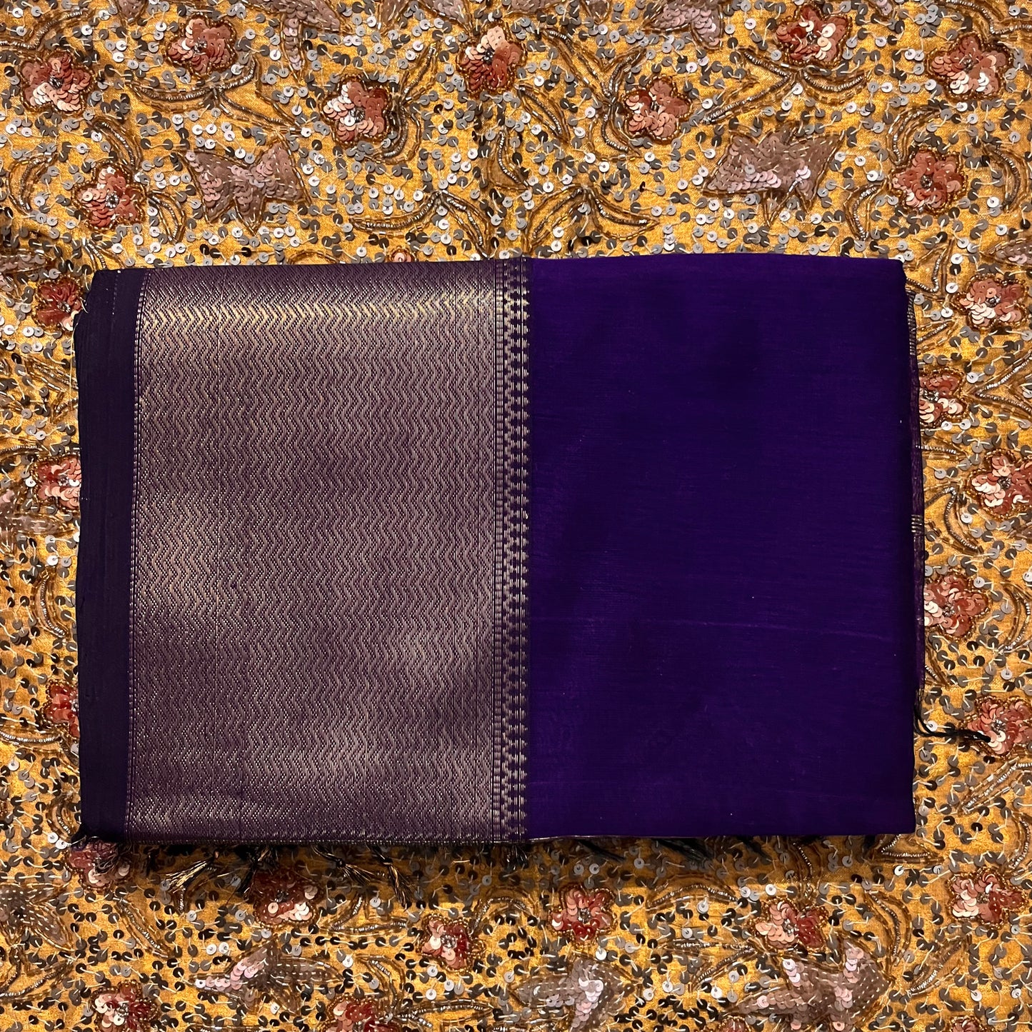 Dark purple Maheshwari saree with zari lines on pallu