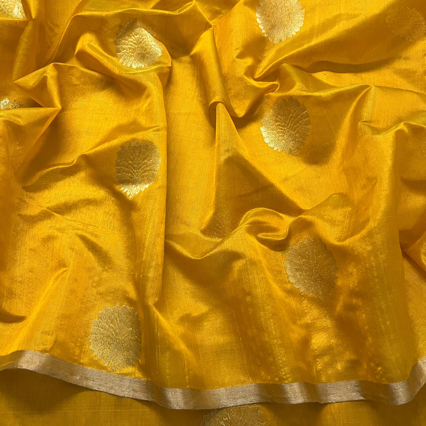 Yellow chanderi silk saree with mor motifs all over