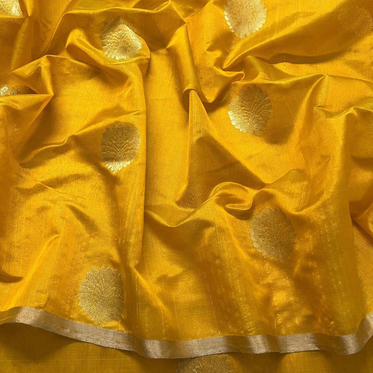 Yellow chanderi silk saree with mor motifs all over
