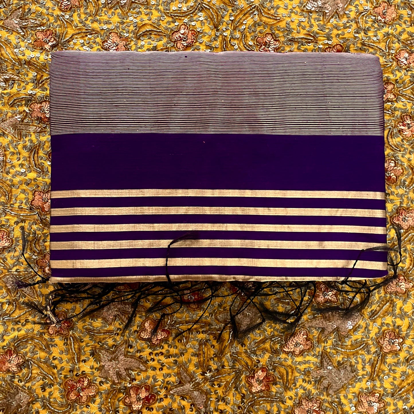 Dark purple and gold Maheshwari saree with zari stripes all over