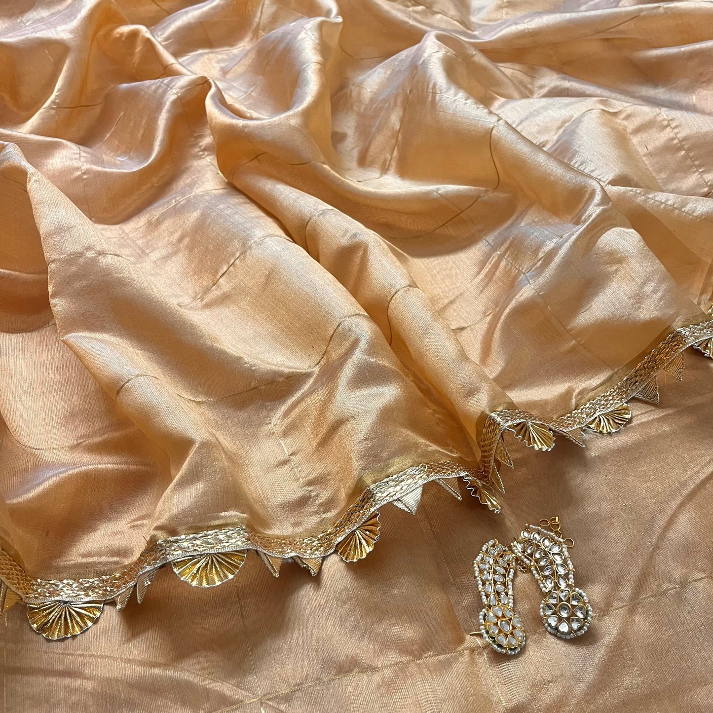 Sand beige Chanderi silk saree with zari checks all over and gota border