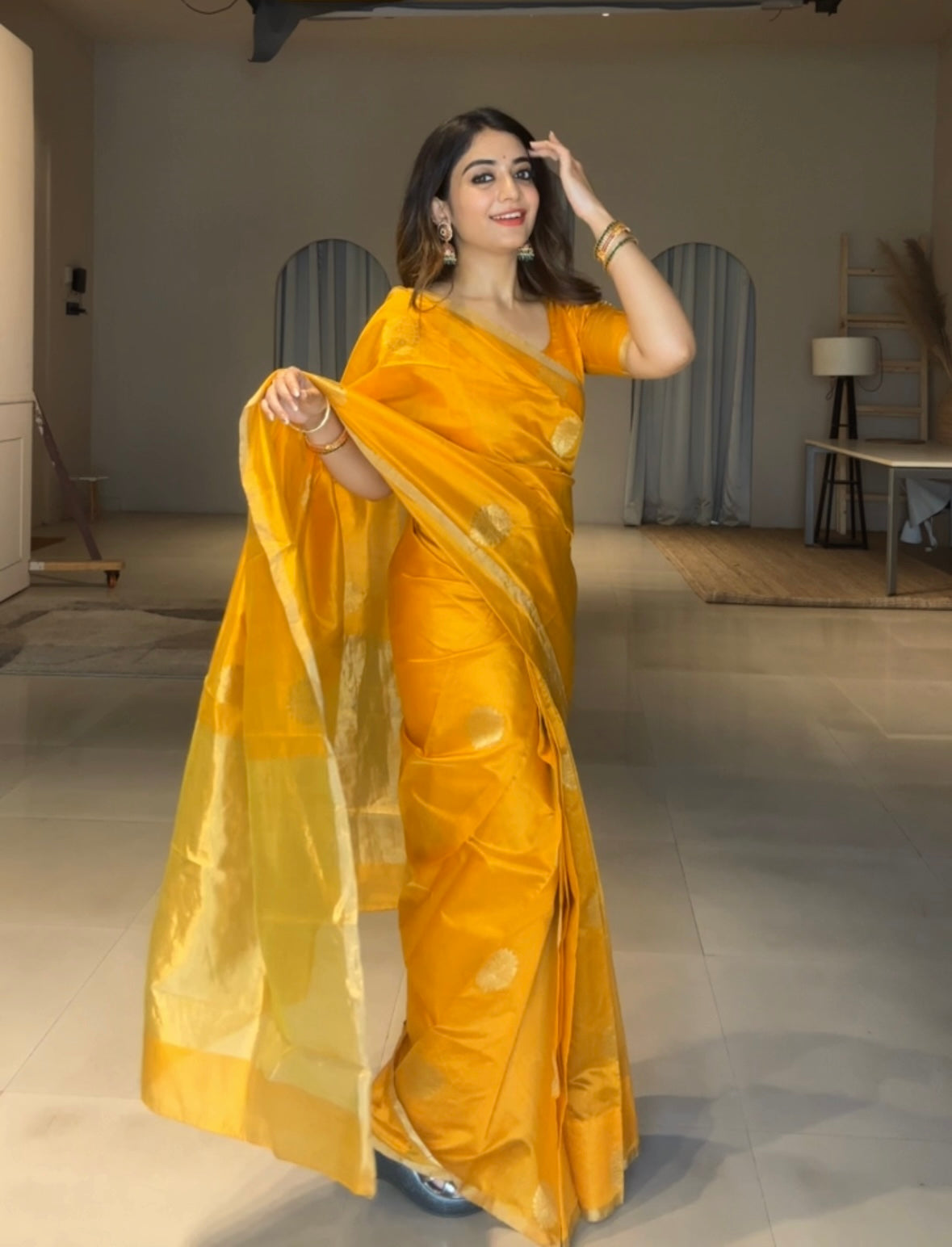 Yellow chanderi silk saree with mor motifs all over