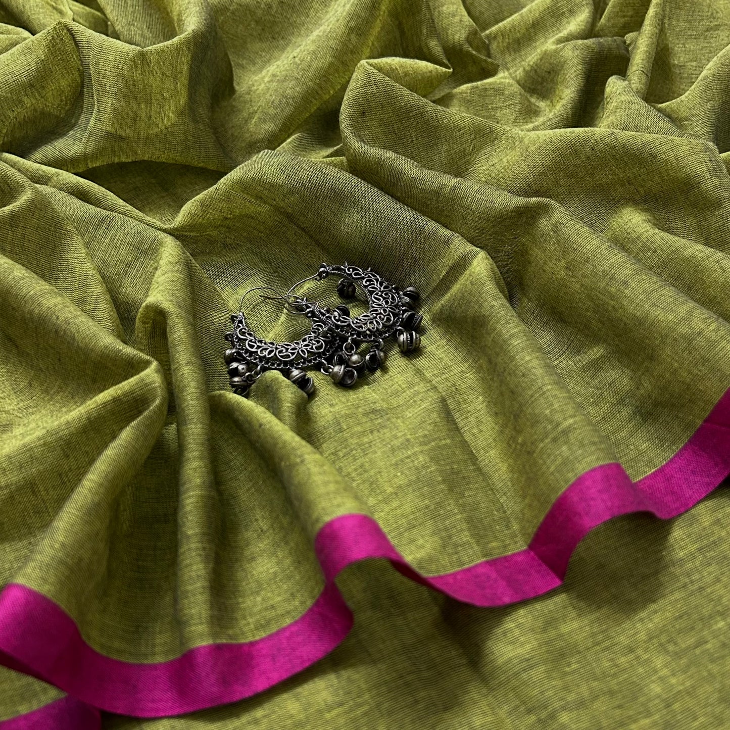 Olive green and pink mulmul saree