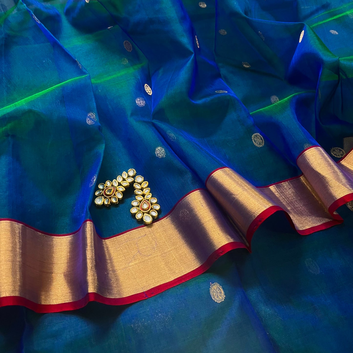 Peacock blue dual tone Chanderi silk saree with zari motifs on pallu