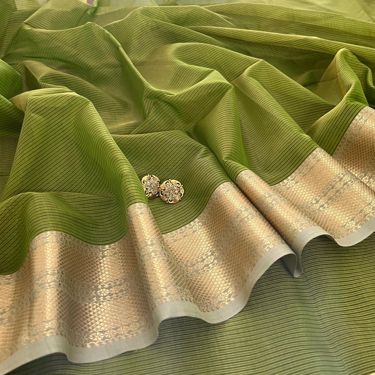 Moss green Maheshwari saree with zari border