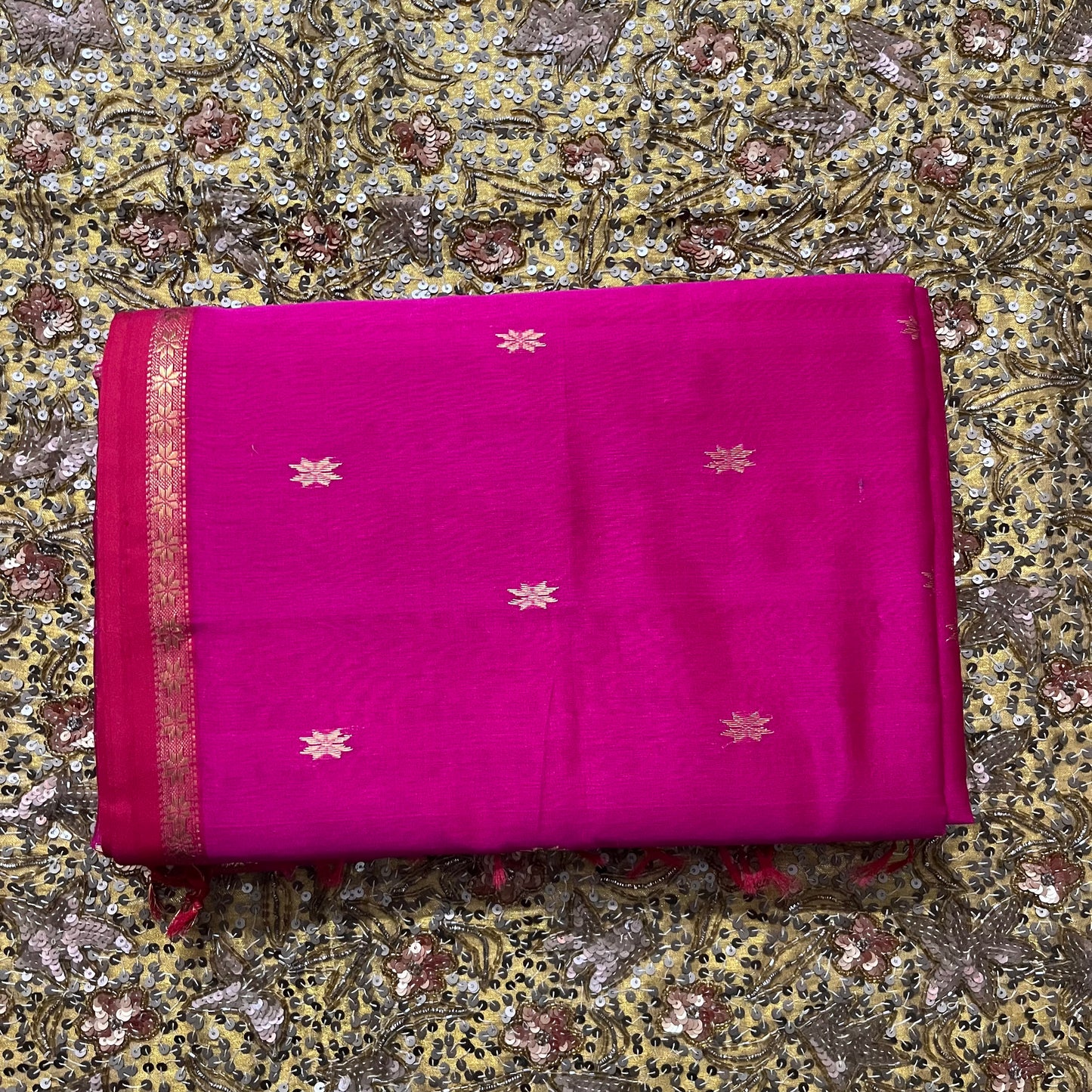 Pink Maheshwari saree with flower bootis all over