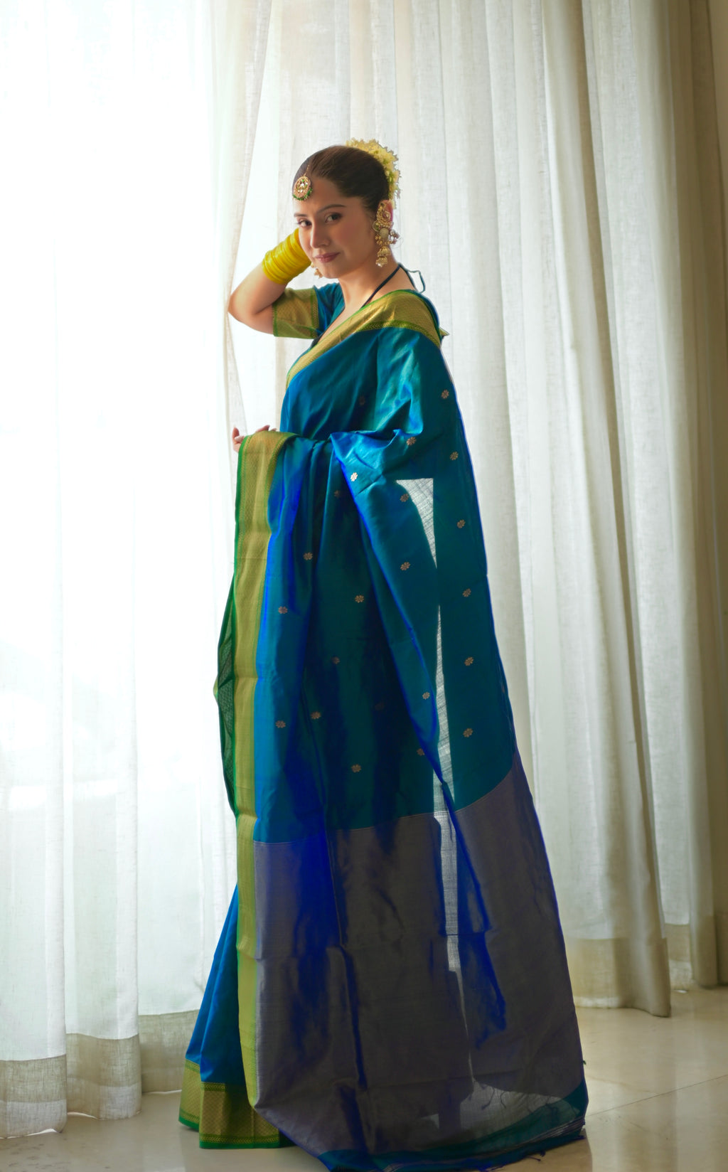 Peacock blue and green dual tone Maheshwari silk saree with zari bootis all over