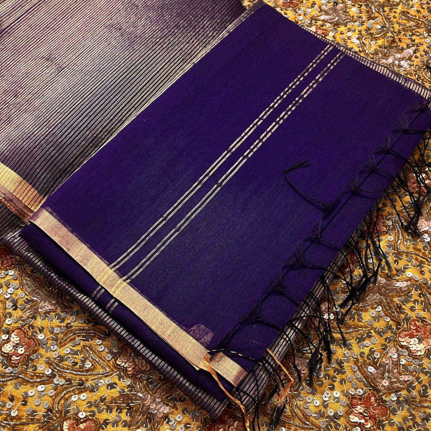 Dark purple and gold maheshwari saree with zari border
