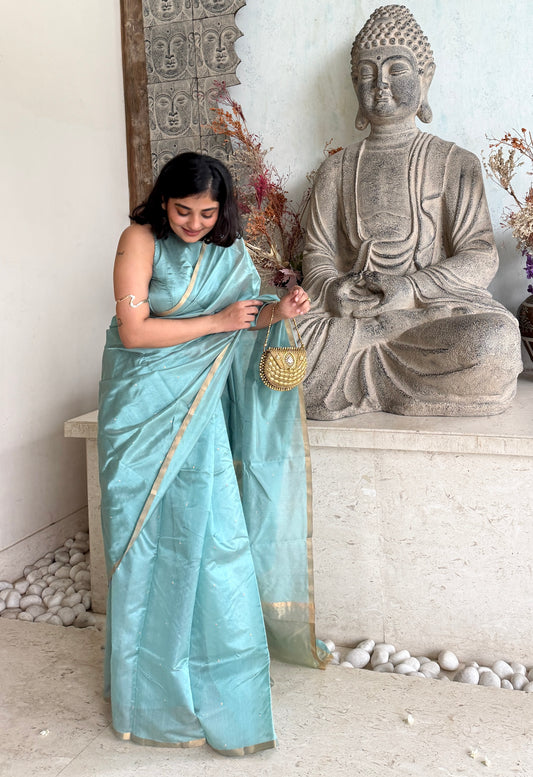 Baby blue chanderi silk saree with zari bootis all over