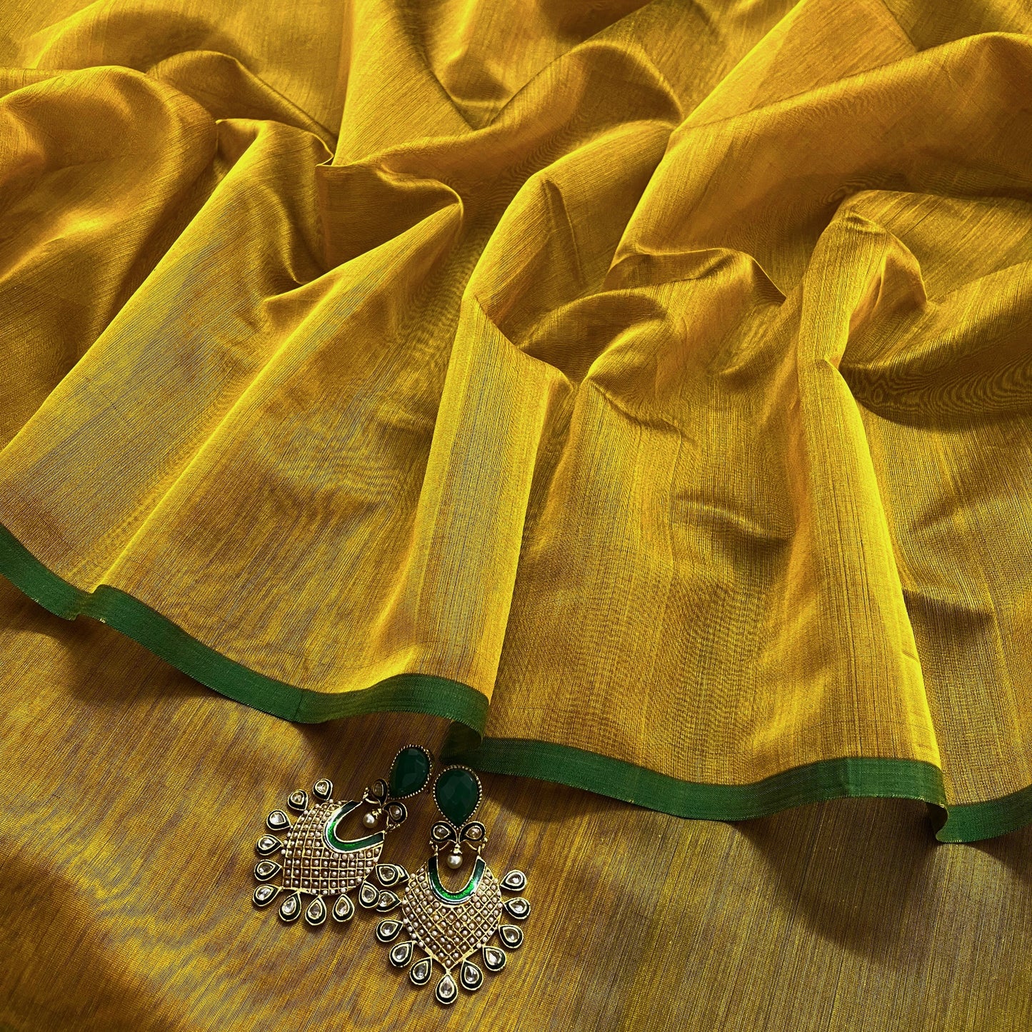 Mustard and green maheshwari saree