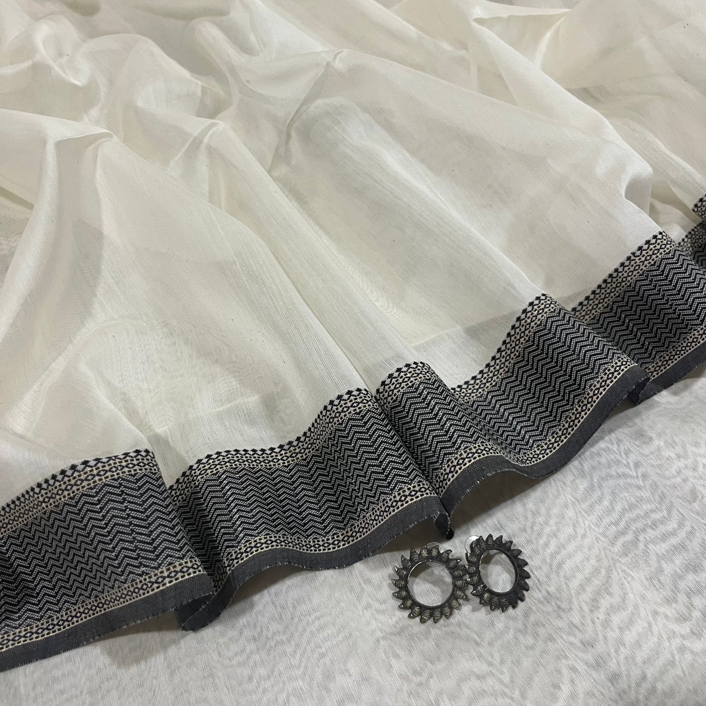 White and Black Maheshwari saree with resham border and Threadwork on pallu