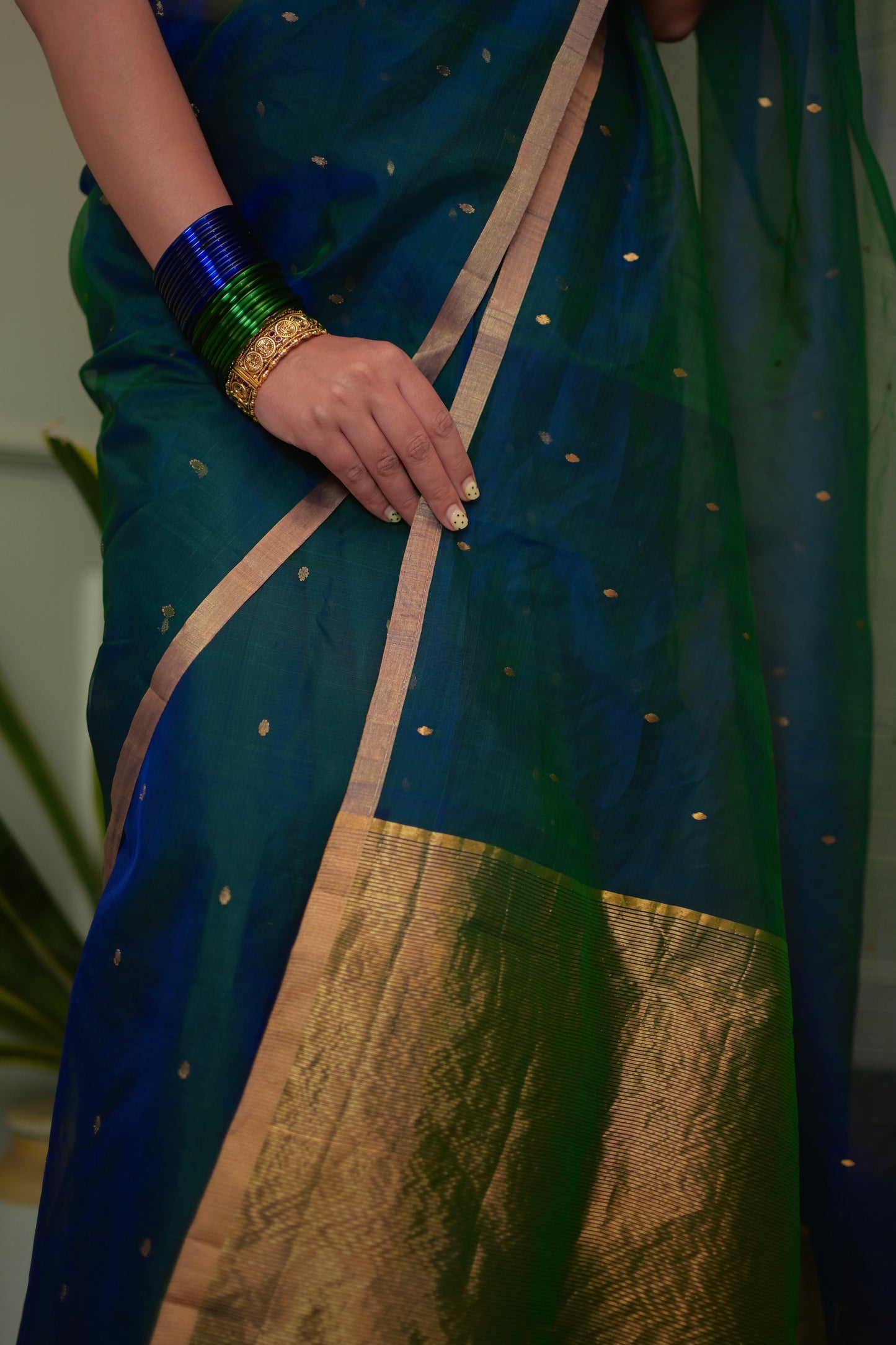 Peacock blue and green dual tone Chanderi organza silk saree with zari bootis all over