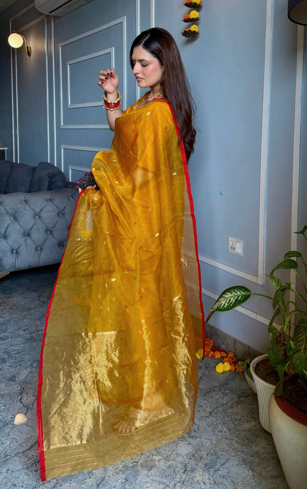 Mustard red Chanderi silk saree with zari bootis all over