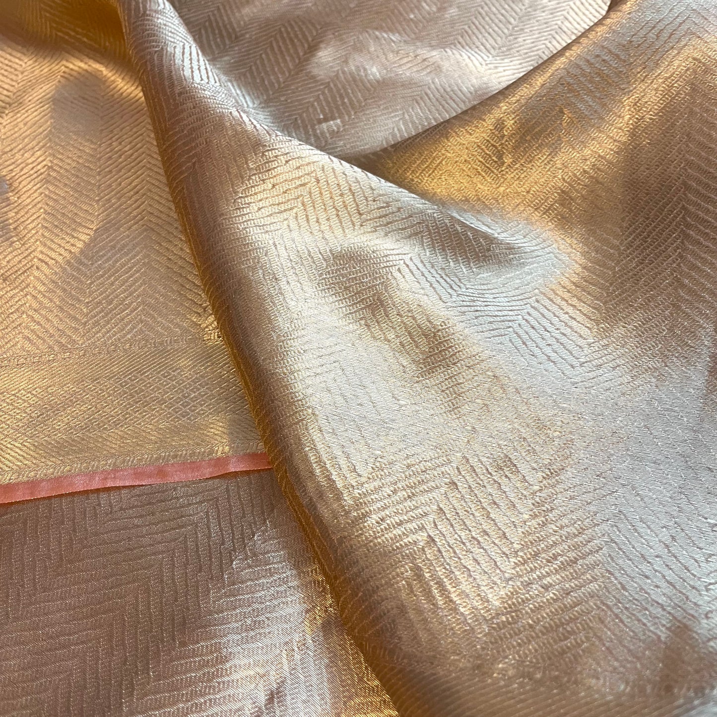 Champagne gold Banarasi silk saree with zari pattern all over