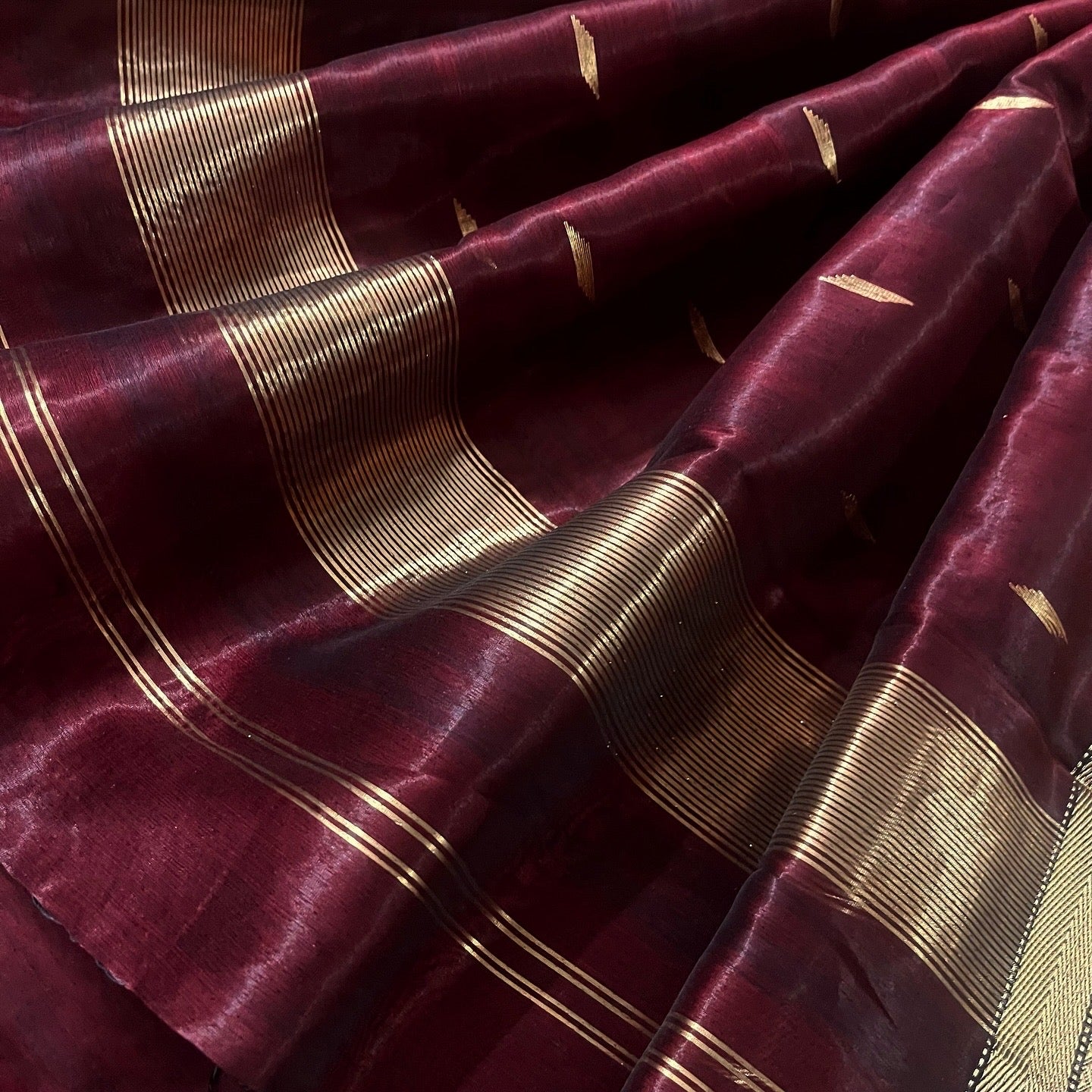 Mahogany Maheshwari tissue silk saree with zari bootis all over